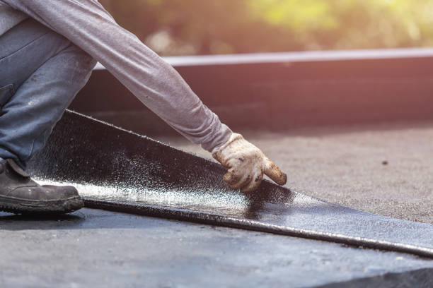 Professional Basement Waterproofing technician working in Coram, NY